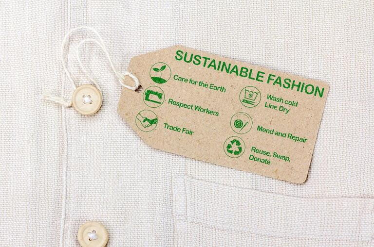 Sustainable fashion label with text and icons